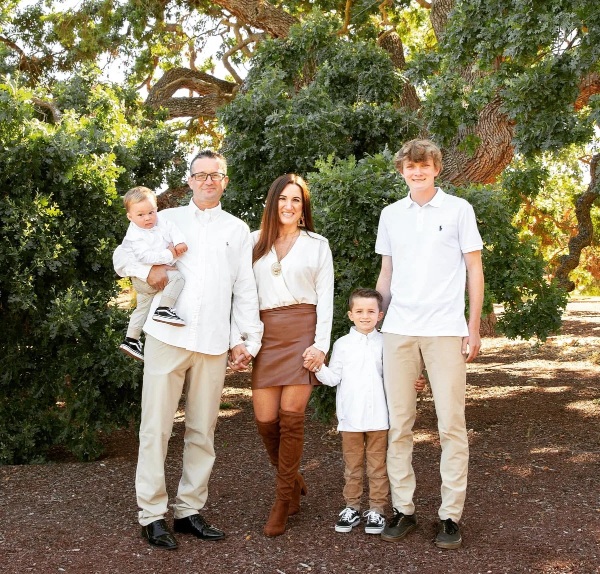 The family behind MBZ Auto Body & Mechanical together outdoors