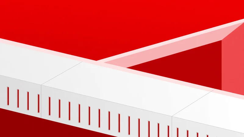 Close-cropped geometric composition of white rectangular barrier forms with vertical red slots against solid red background and pink edge highlights