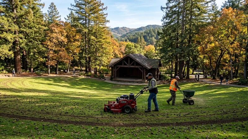 Town of Moraga parks workers aerating and reseeding the amphitheater lawn in front of the wooden bandshell at Moraga Commons Park in Moraga