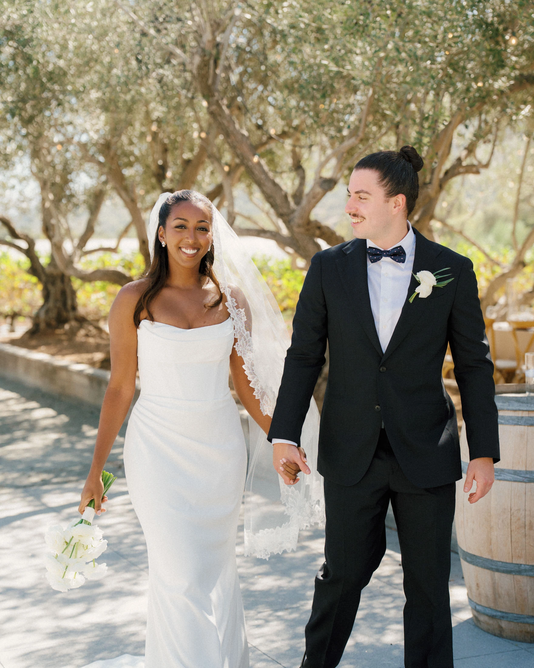Mekaleya Tilahun and Raumin Neuville on their wedding day at MOHI Ranch in Morgan Hill, California, on October 10, 2026