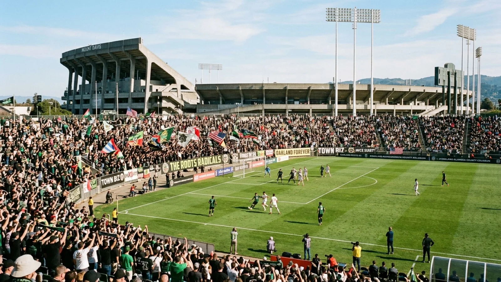 Supporters and soccer fans celebrate at the historic Oakland-Alameda County Coliseum grounds