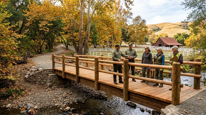 Park rangers and trail volunteers inspecting a newly planked timber pedestrian bridge over San Ramon Creek inside Hap Magee Ranch Park in Alamo